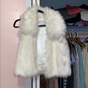 White fake fur vest